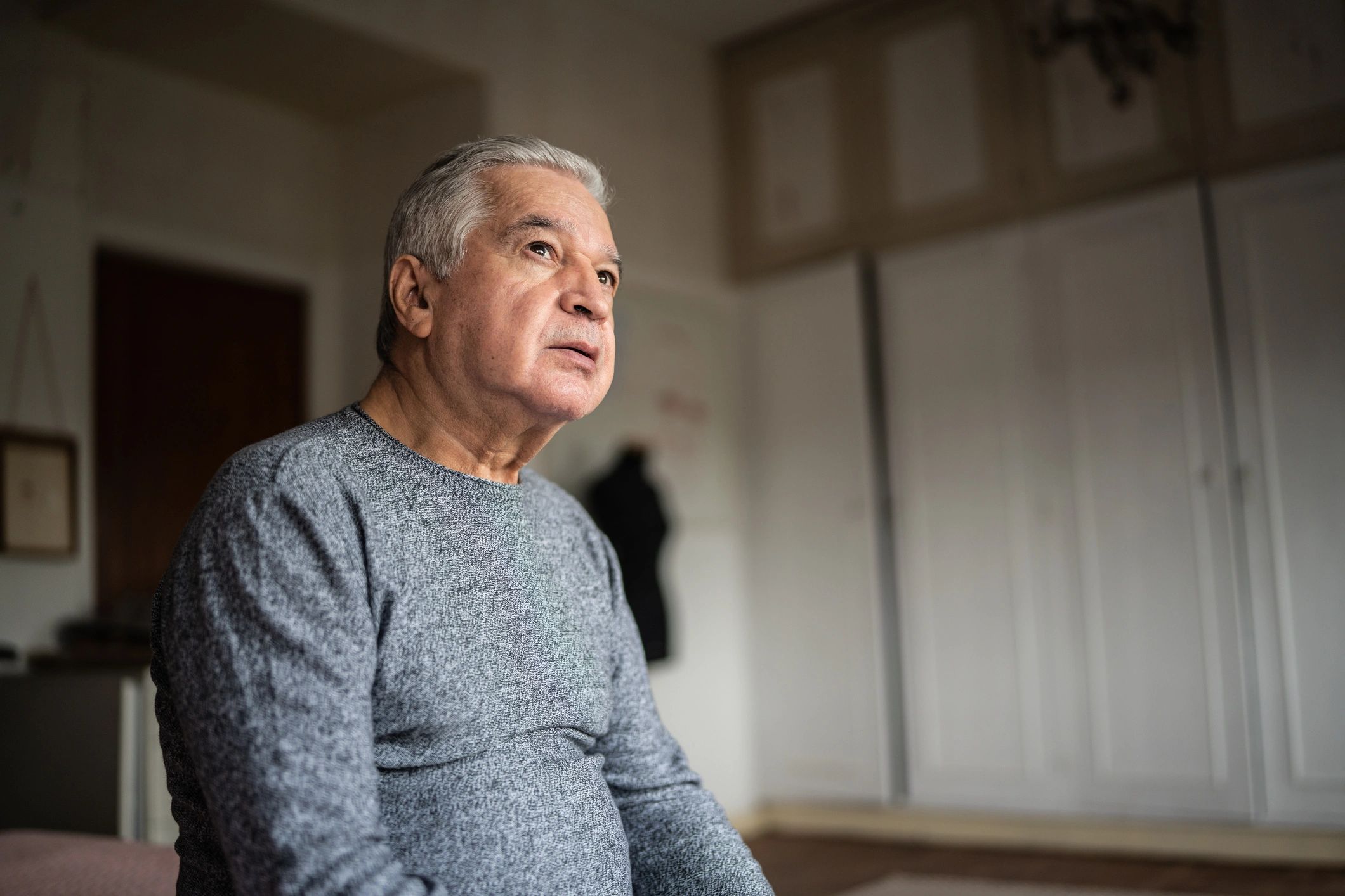 Senior at home preparing for daily routine