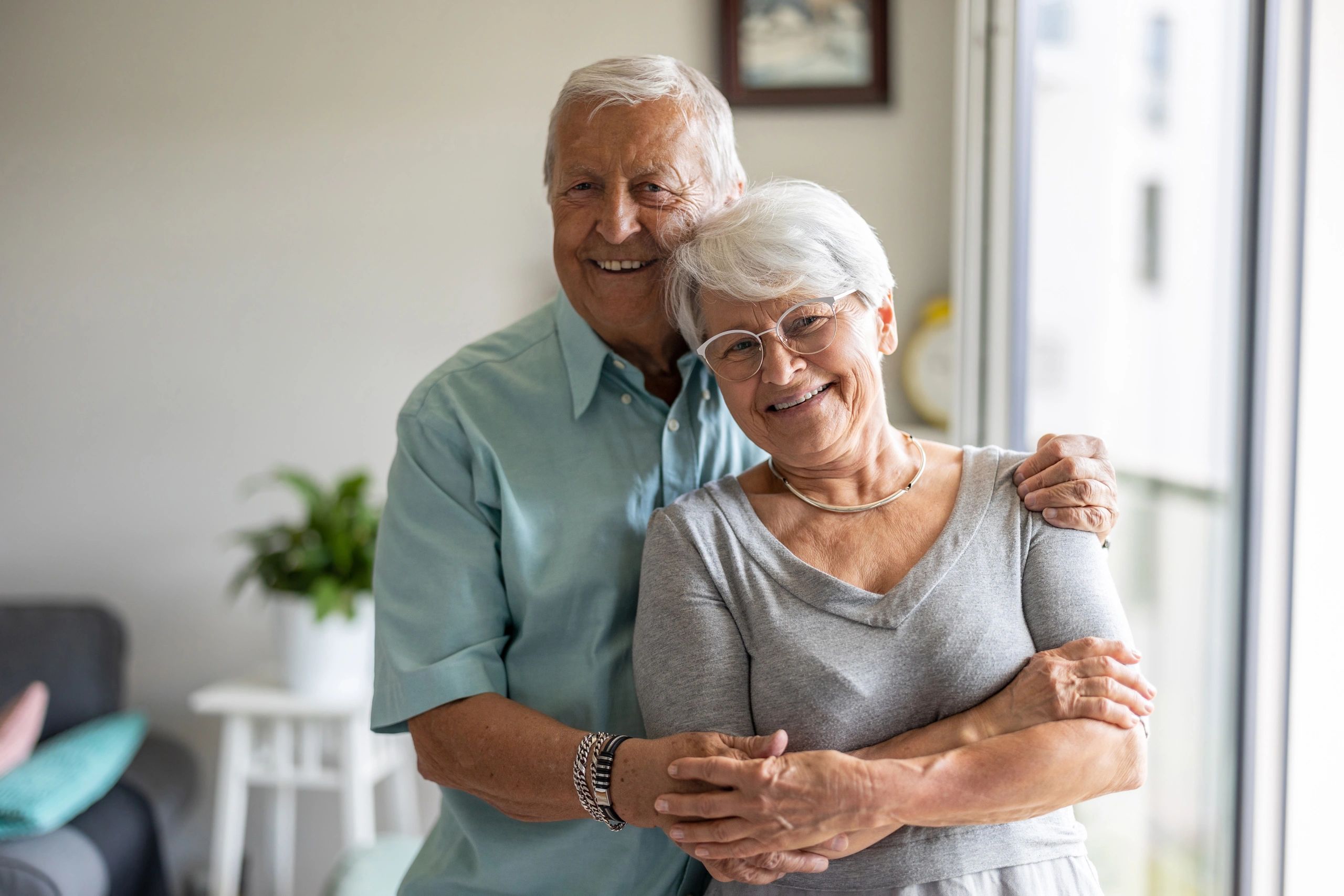 Happy senior couple at home