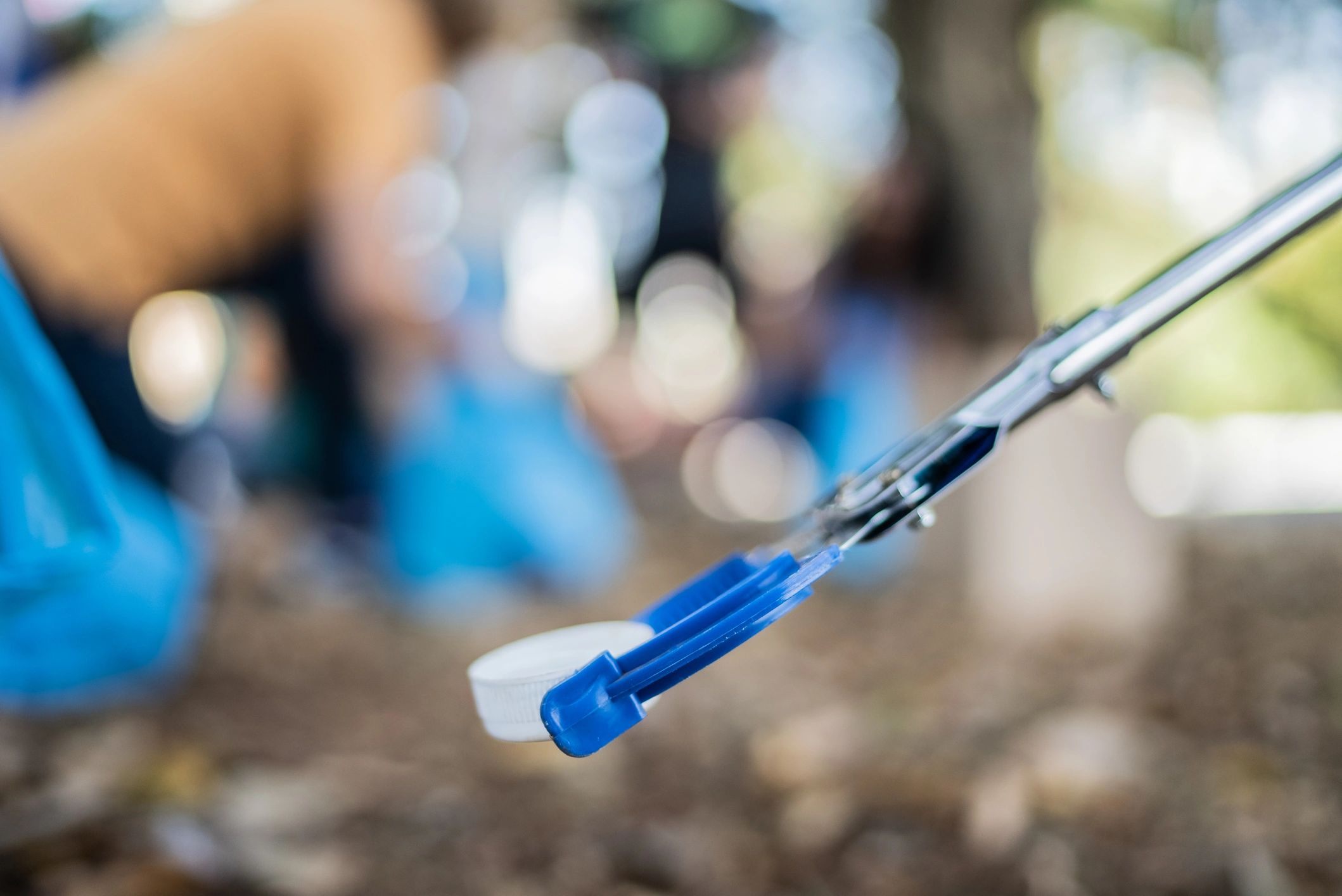 Reacher grabber tool used to pick up items without bending or climbing