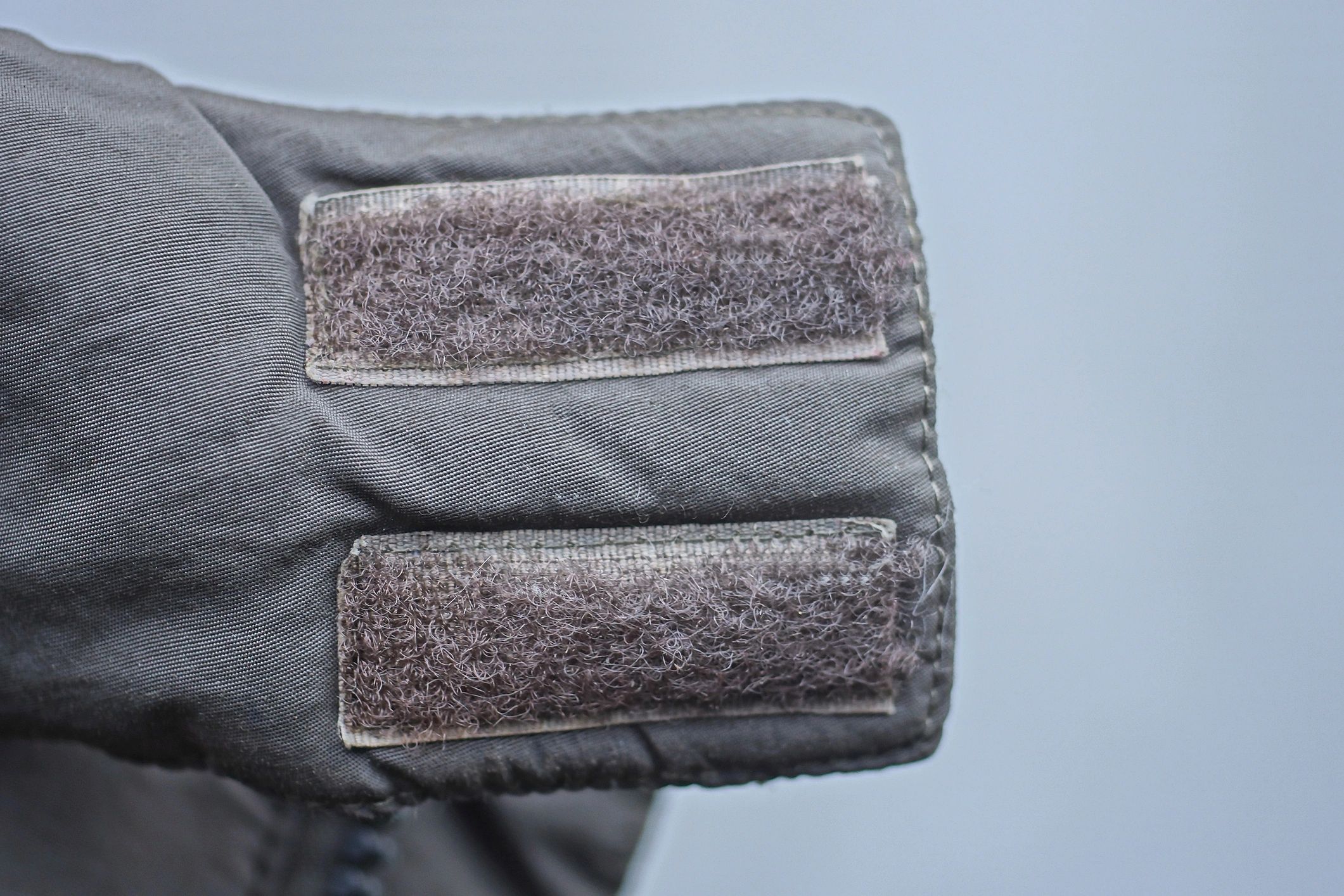 Adaptive clothing with Velcro closures on a jacket collar