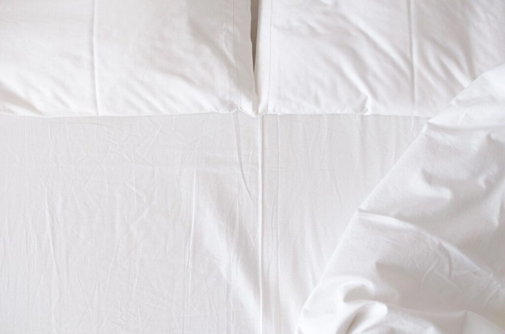 Slide sheet on a bed for repositioning